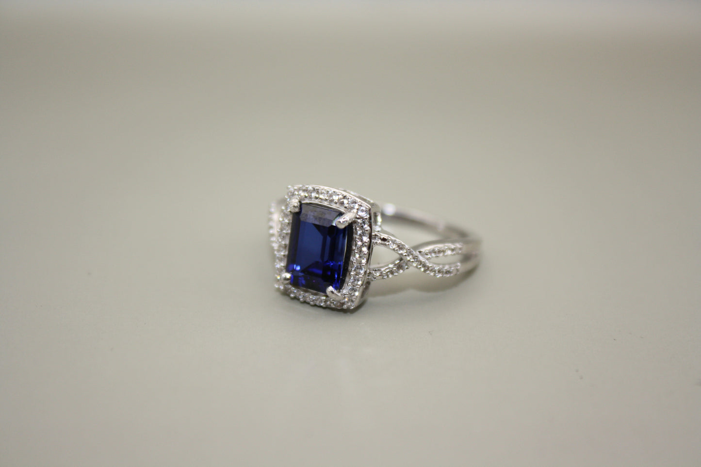 Emerald Cut Lab Sapphire Halo Ring in Sterling Silver