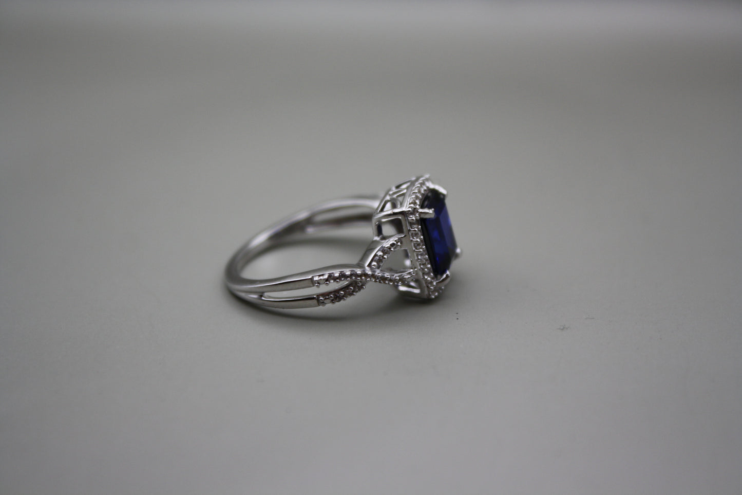 Emerald Cut Lab Sapphire Halo Ring in Sterling Silver