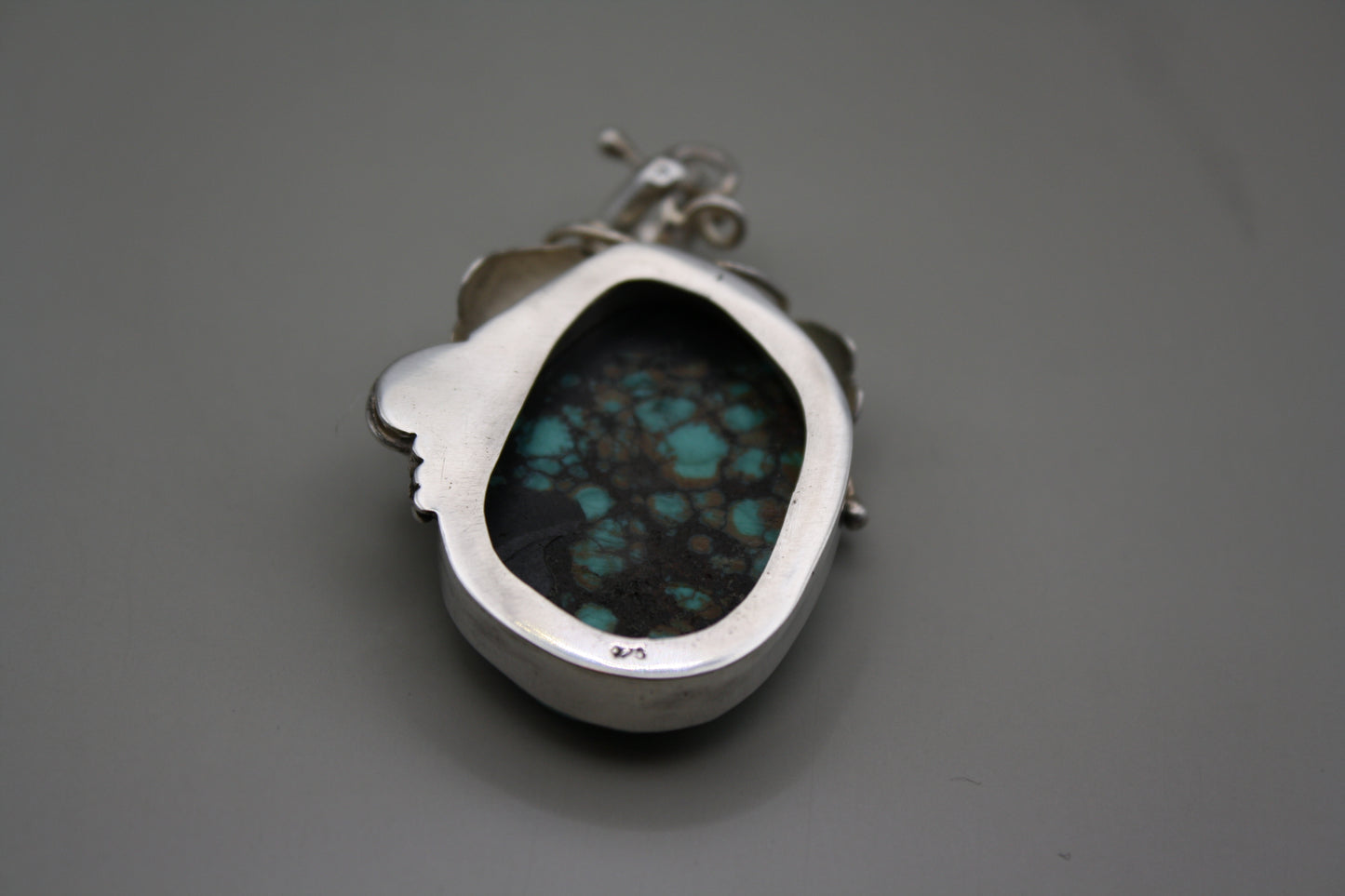 Sterling Silver Turquoise Cabochon Pendant: Nature-Inspired Foliage Wrap