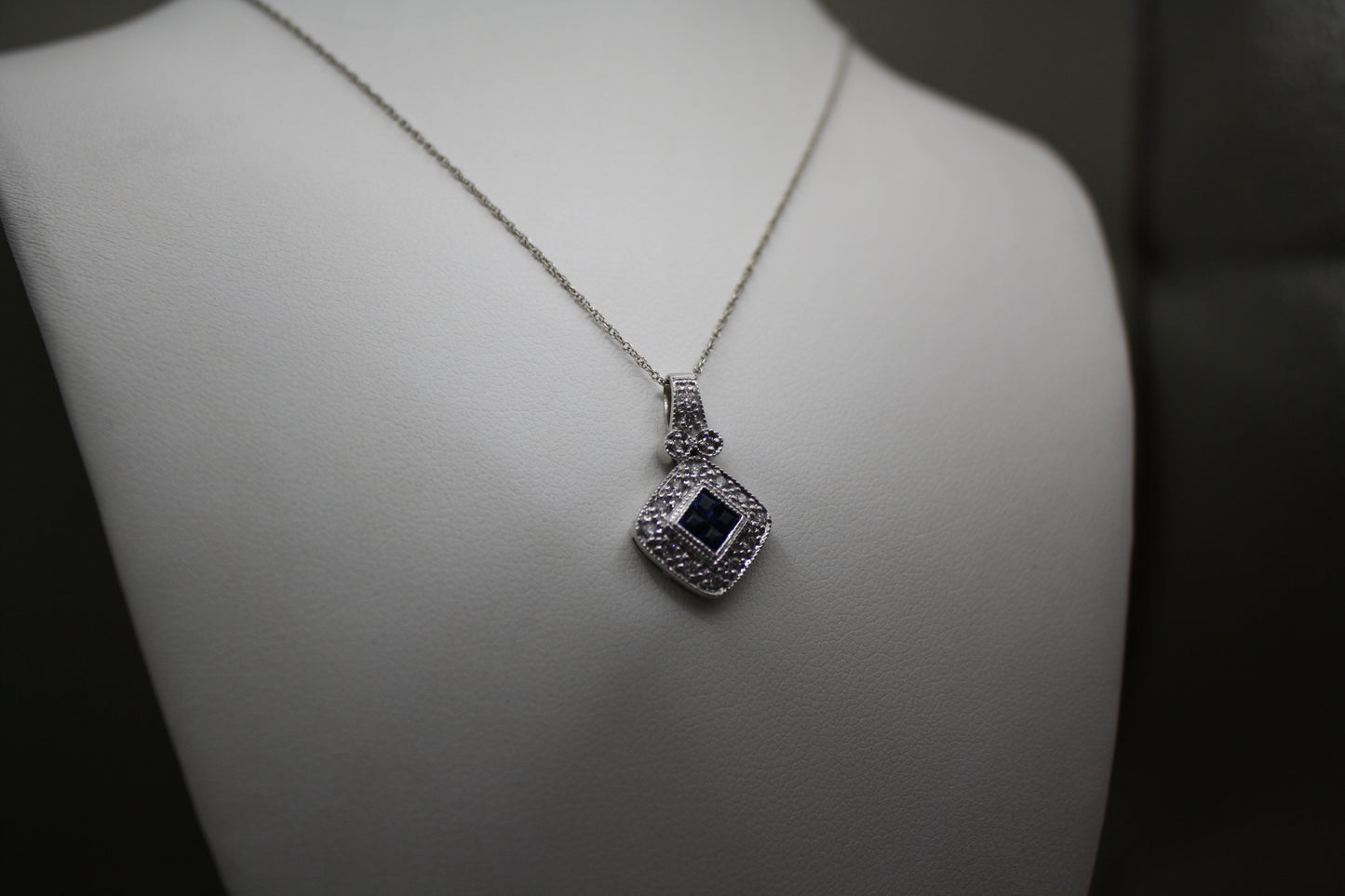 Blue Sapphire and Diamond Halo Necklace in 14K White Gold