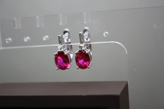 Radiant Ruby Duo: Sterling Silver Oval Ruby and White Topaz Jewelry Set