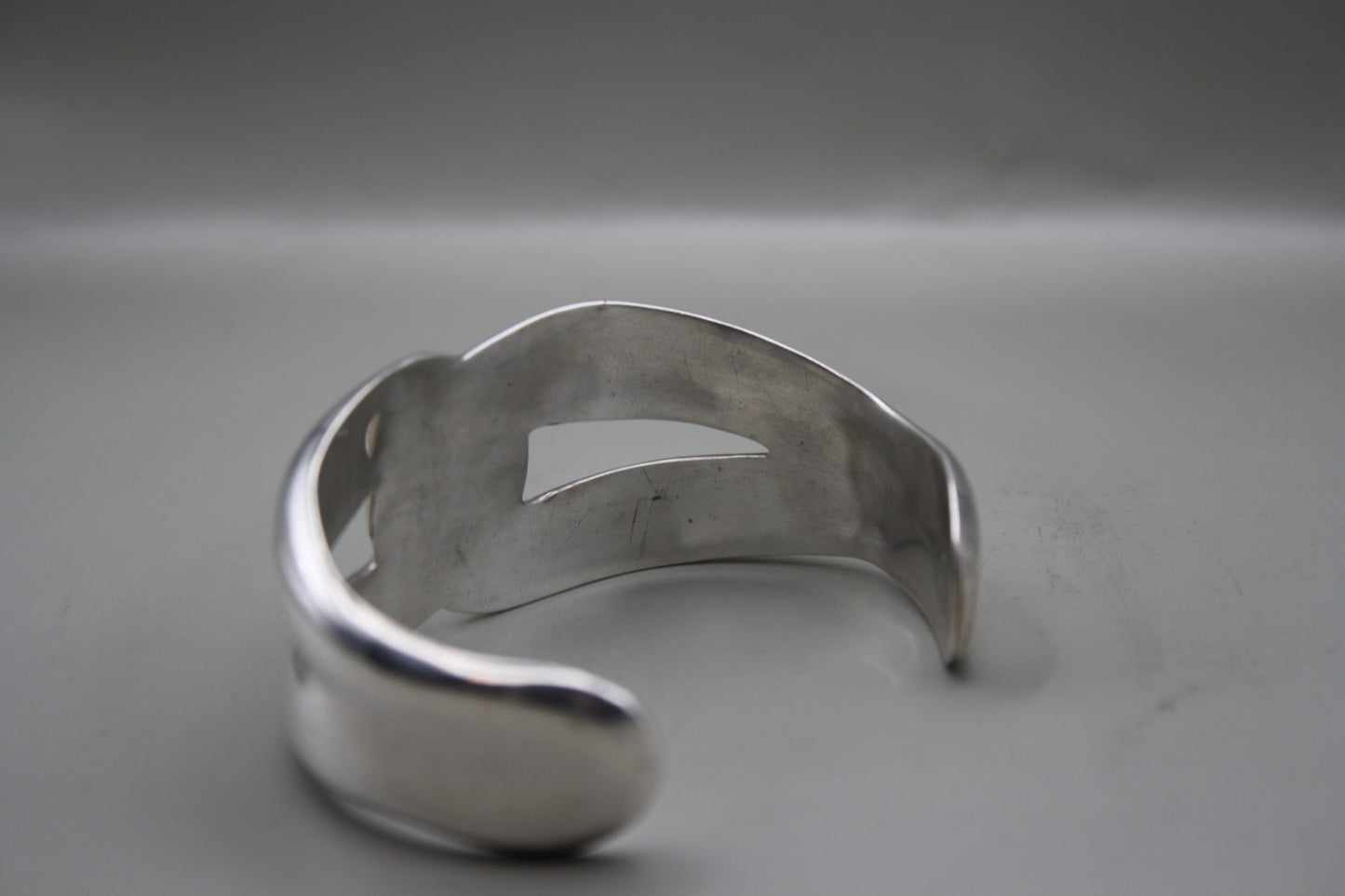 Vintage Taxco Mid-Century Modern Sculptural Sterling Silver Interlocking Twist Loop Cuff