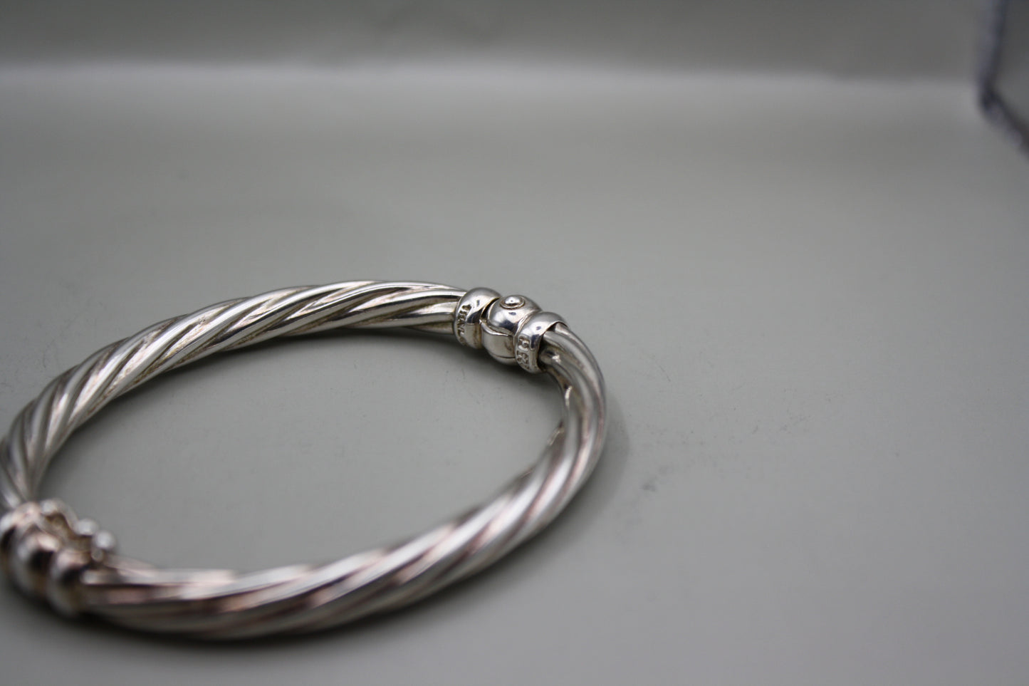 Sterling Silver Hollow Round Twist Sculptural Bangle