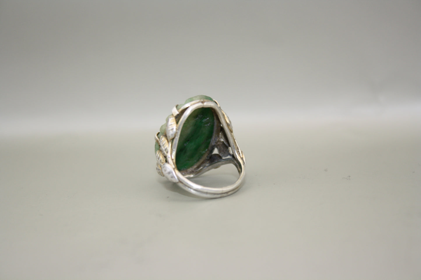 Antique Carved Jadeite Sterling Silver Ring with Intricate Leaf and Vine Motif